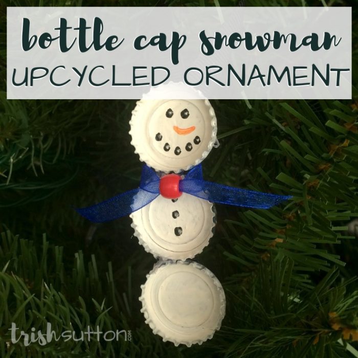 Upcycle bottle caps to create cute Christmas tree ornaments. This simple creation is perfect for kids & adults alike. Bottle Cap Snowman Ornament.
