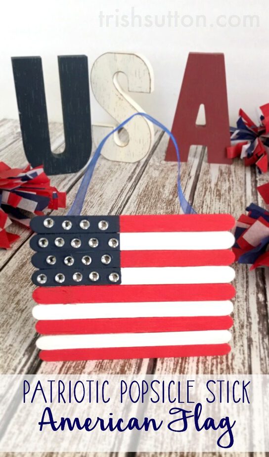 A Patriotic Popsicle Stick American Flag is a kids craft to show patriotism on Memorial Day, Flag Day, Independence Day and all summer long! TrishSutton.com