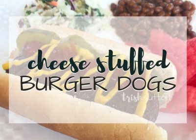 Backyard BBQ season has arrived! If cheeseburgers are on your grill menu you must try this twist; Grilled Cheese Stuffed Burger Dogs. TrishSutton.com