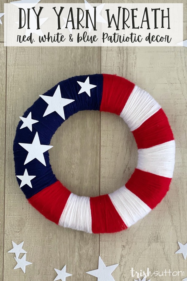 Create simple summer red, white and blue patriotic decor with this easy to follow DIY Yarn Wreath tutorial.